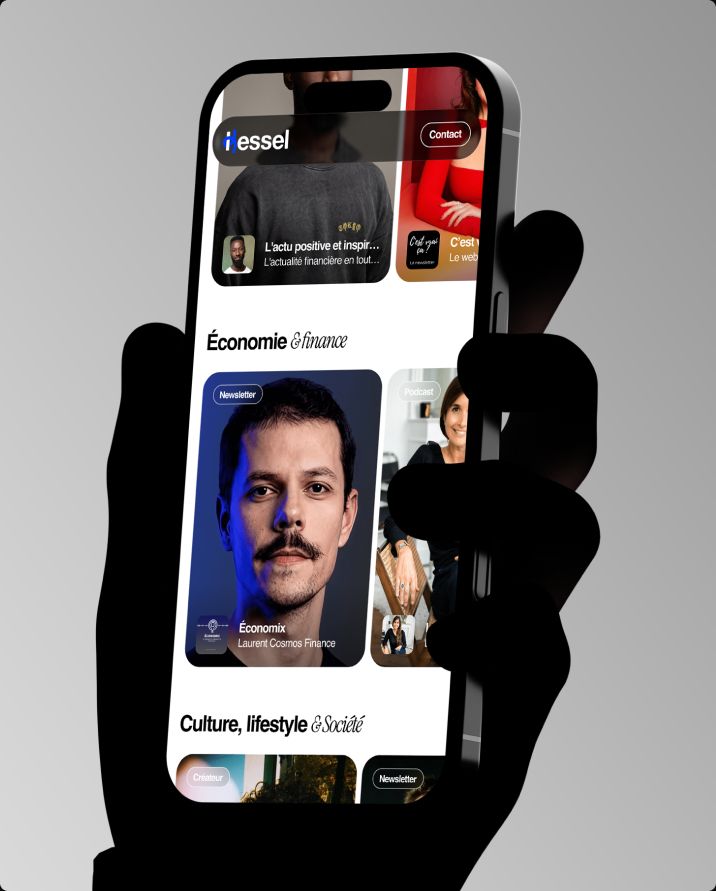 Hand holding a phone with the Kessel creators feed by topic